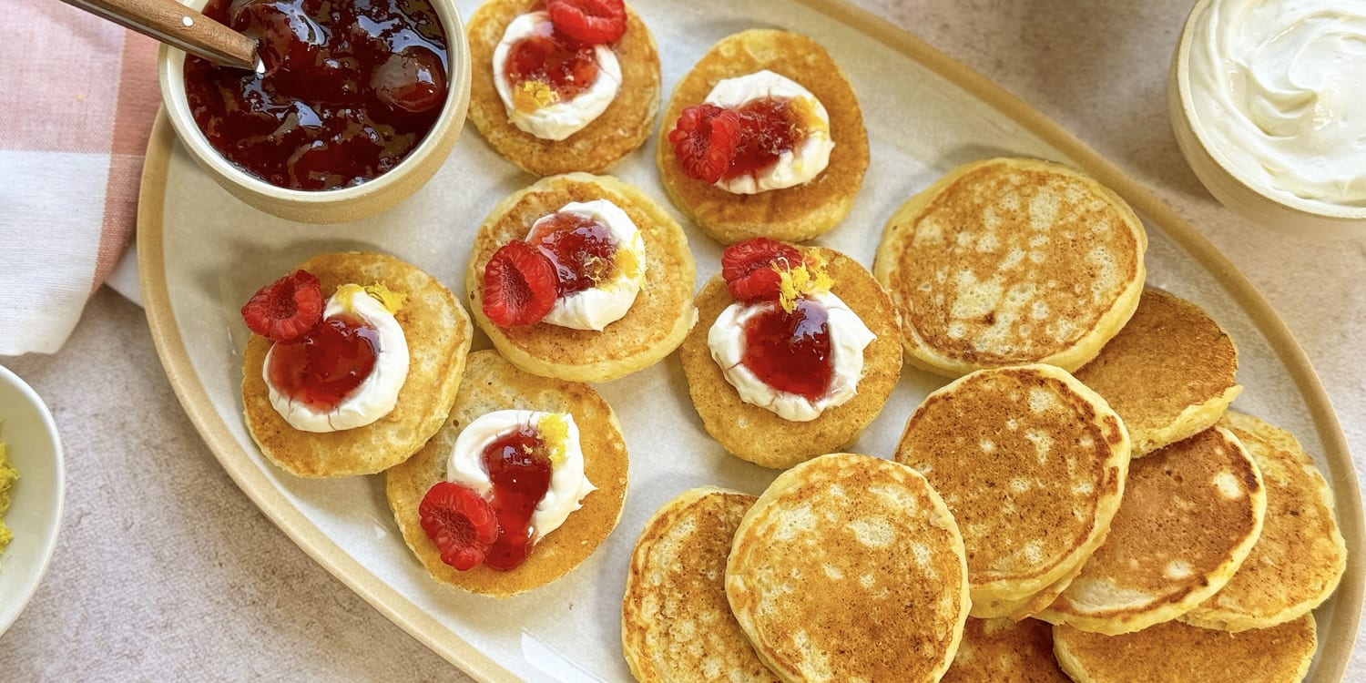 Mini lemony pancakes topped with jam is the ultimate holiday treat