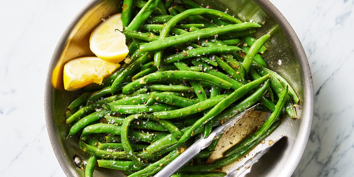 Steam and sauté green beans in one pan for a quick and easy side dish