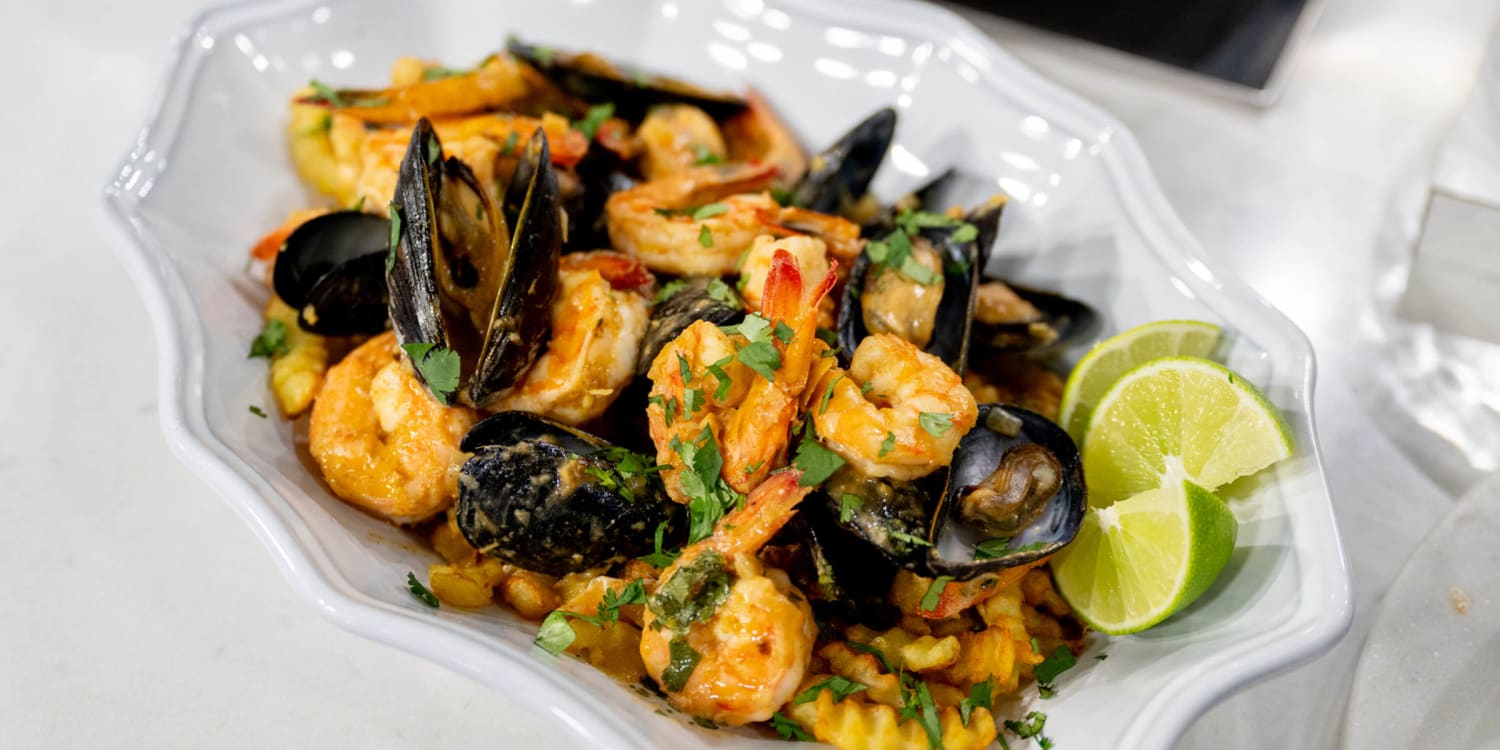 Serve Thai red curry shrimp and mussels with french fries