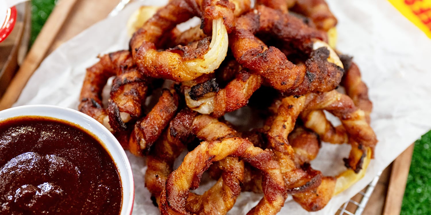 Take your onion rings to the next level by wrapping them in bacon