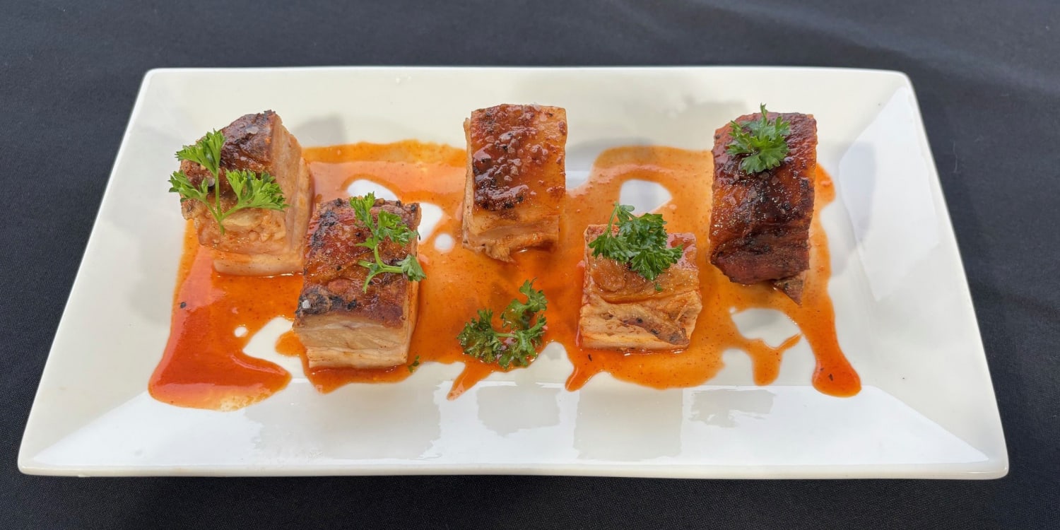 Bourbon and hot honey make these pork belly bites pop
