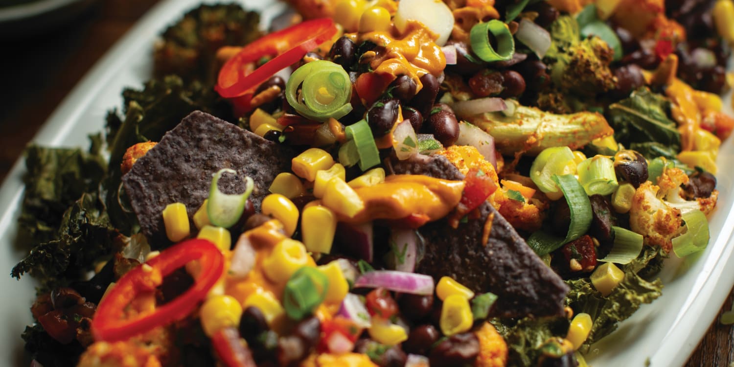 These Korean Nachos Are Loaded With Veggies and Topped With Kimchi Queso
