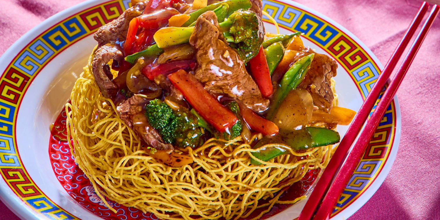 A Saucy Stir-Fry Rests on a Nest of Crispy Noodles in Mì Xào Giòn