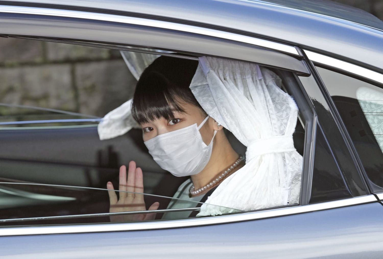 Defying public scorn and media storm, Japan’s princess finally marries
