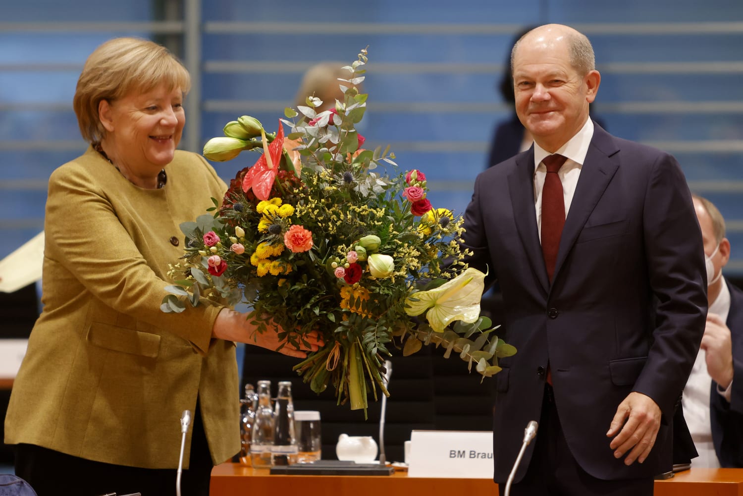 Angela Merkel’s era comes to an end as Olaf Scholz is tapped to run Germany
