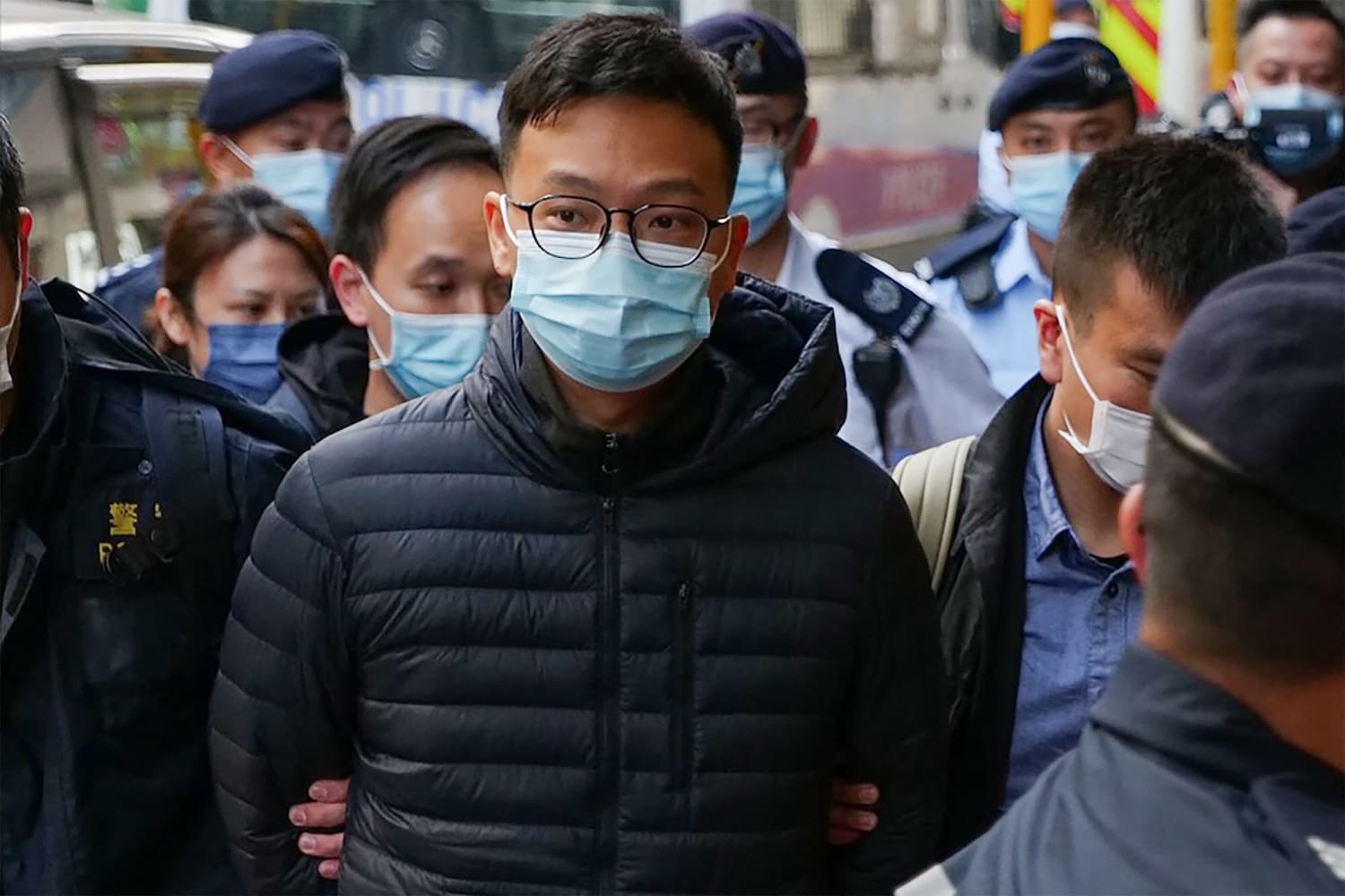 Hong Kong police raid pro-democracy news outlet, arrest senior staff