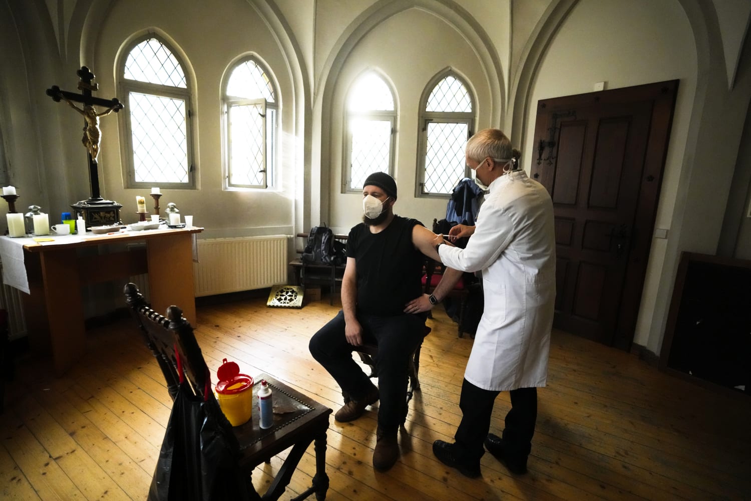 German pastors push for shots in region known for vaccine resistance