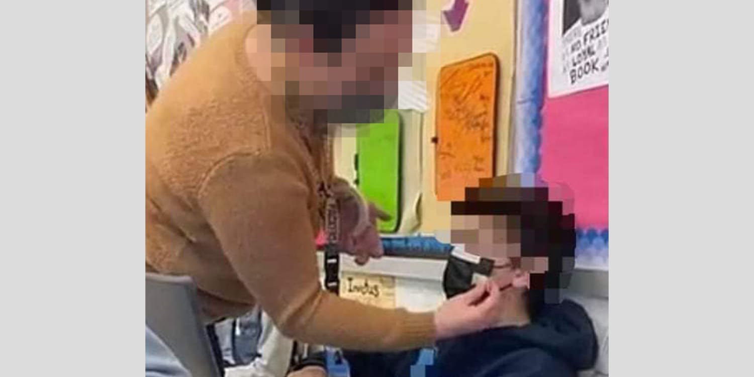 Photo Showing Teacher Tape Mask To Student 'Concerning To Many