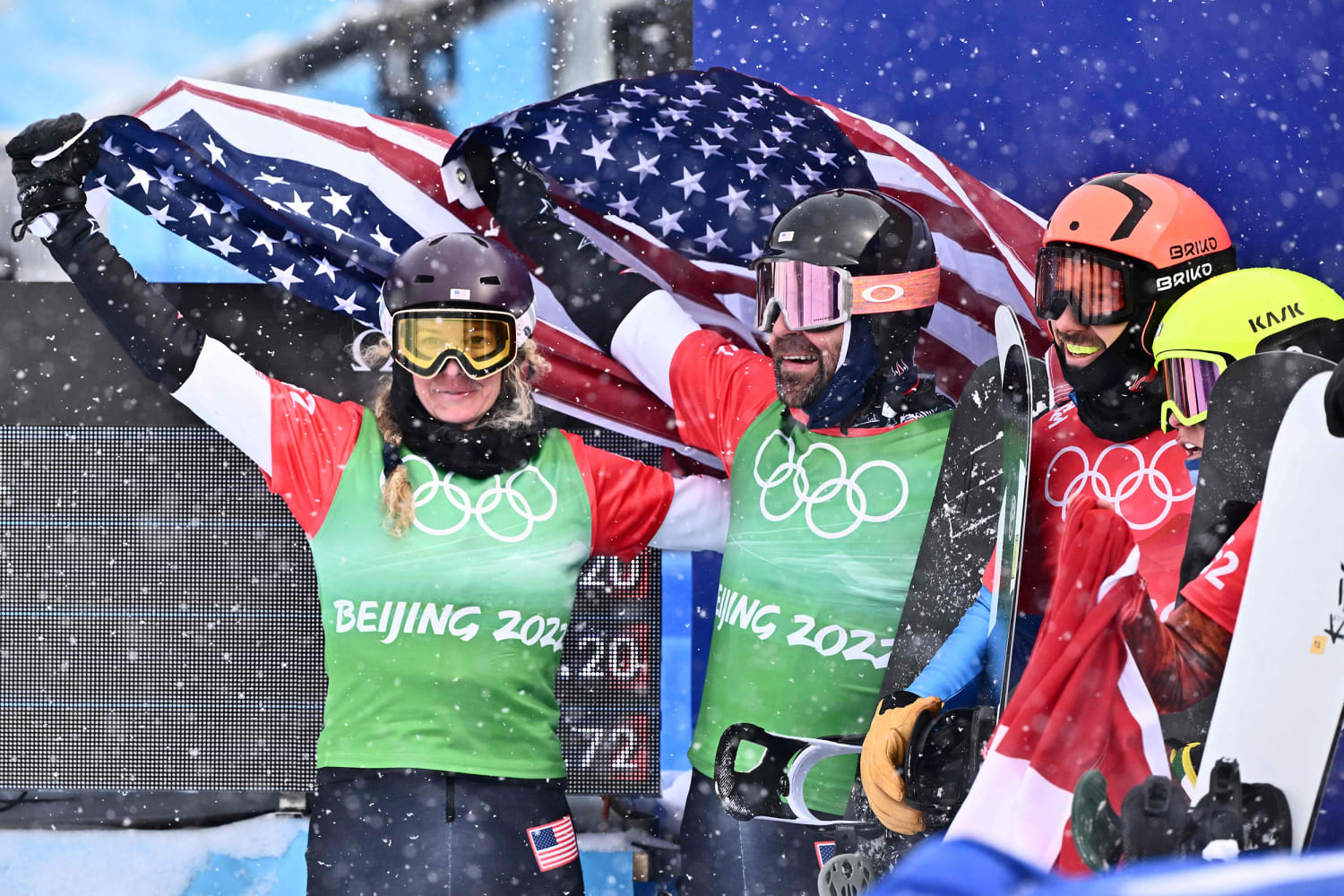 Jacobellis, Baumgartner grab gold Olympic debut of mixed team snowboard cross