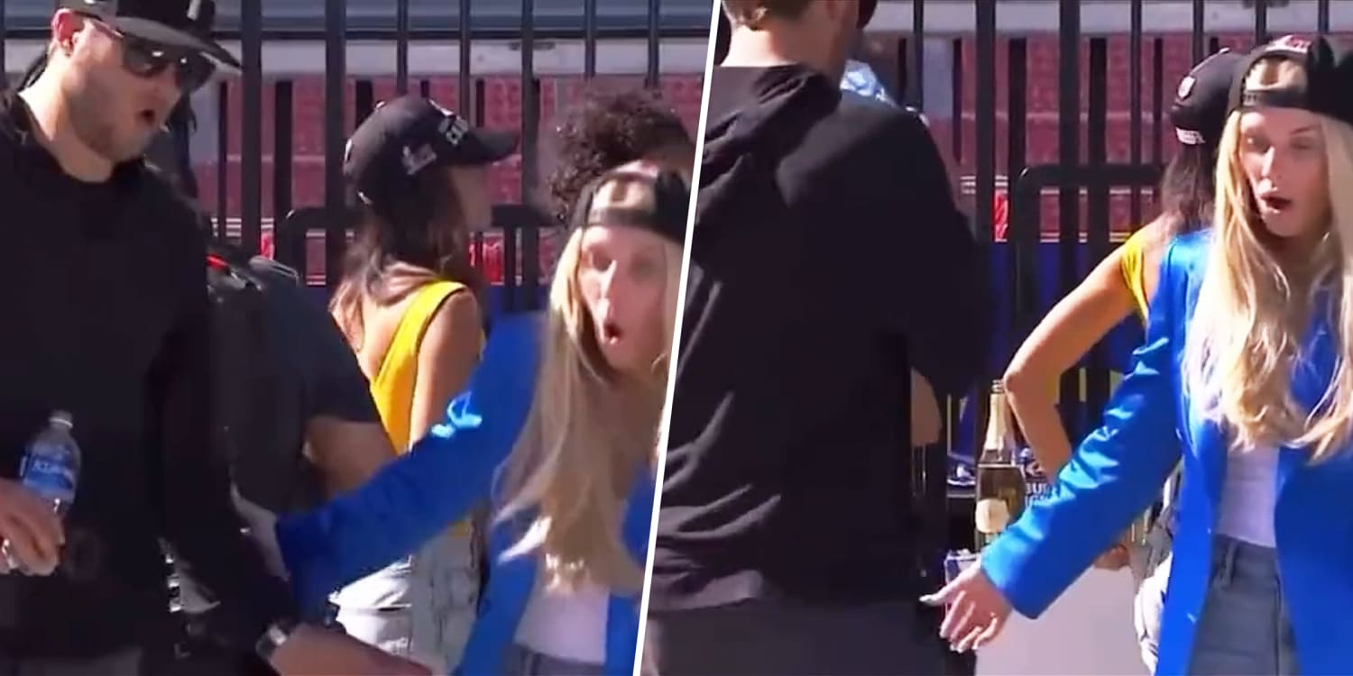 Matthew Stafford turns away as Rams parade photographer falls