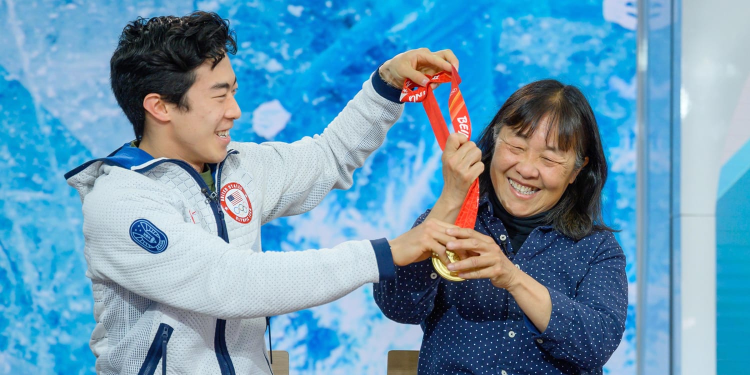 Touch during. Нейтан Чен Богема. The Medal is around his Neck.