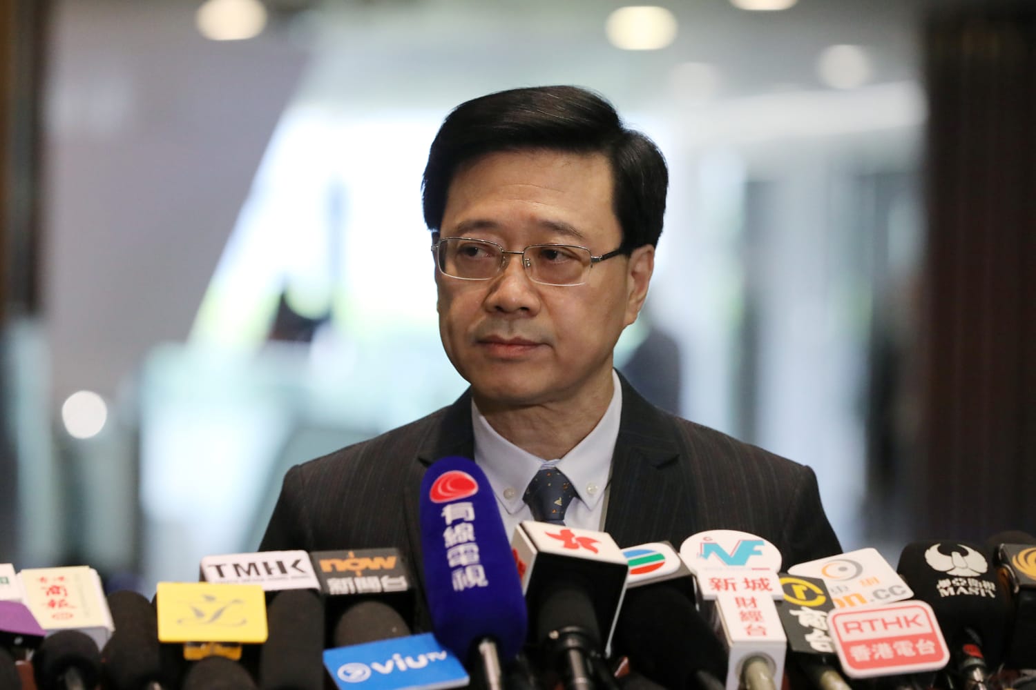 Hong Kong deputy chief John Lee says he plans to run for leader