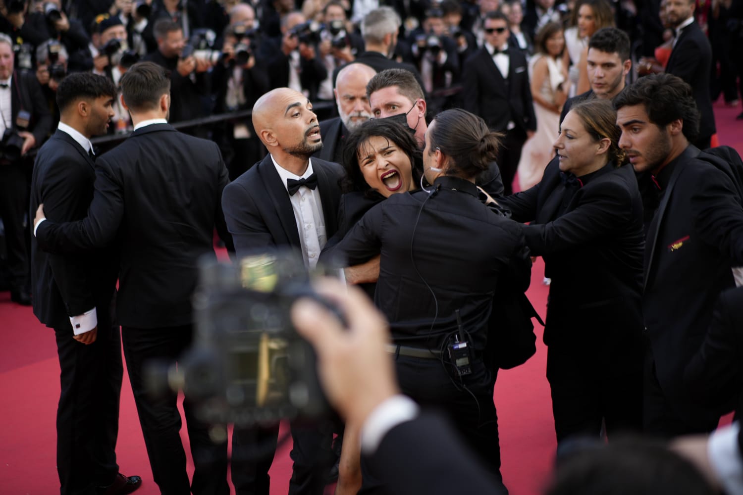 Activist crashes red carpet at Cannes Film Festival to protest Ukraine  sexual violence