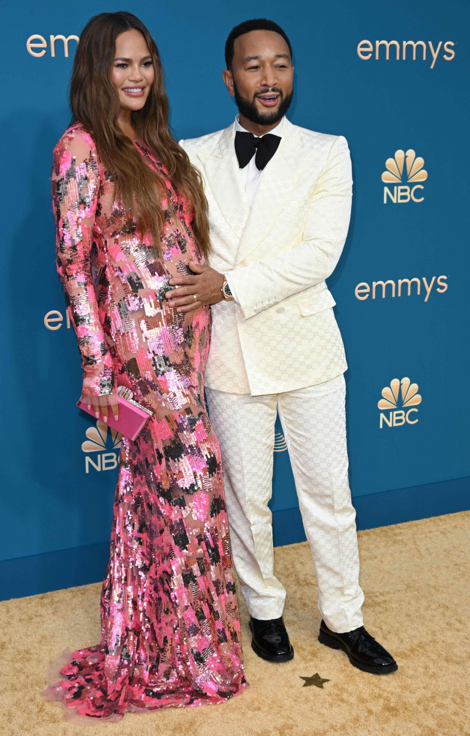 John Legend Cradles Chrissy Teigen's Baby Bump on Emmys Red Carpet