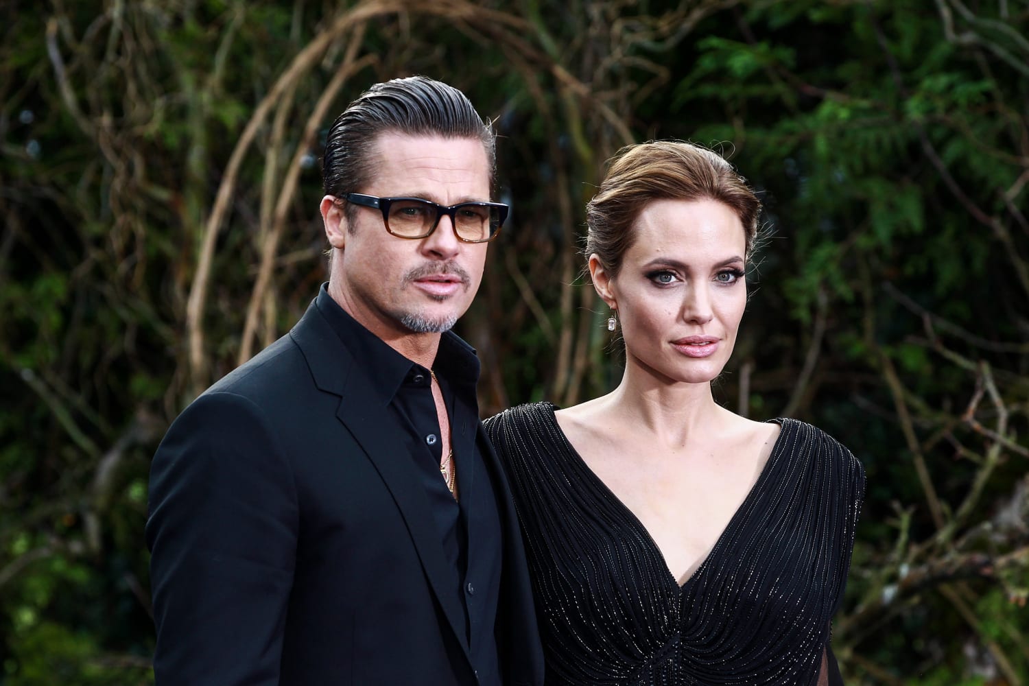 Angelina Jolie accuses Brad Pitt of choking one of their children during mid-air fight