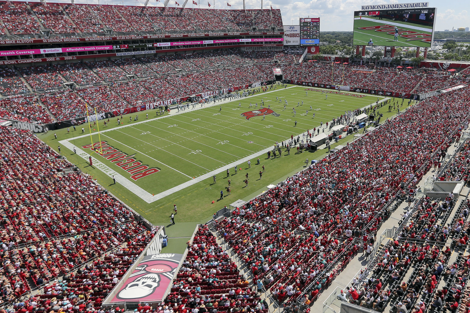 Kid runs on field at Bucs game, gets slammed into ground by security guard