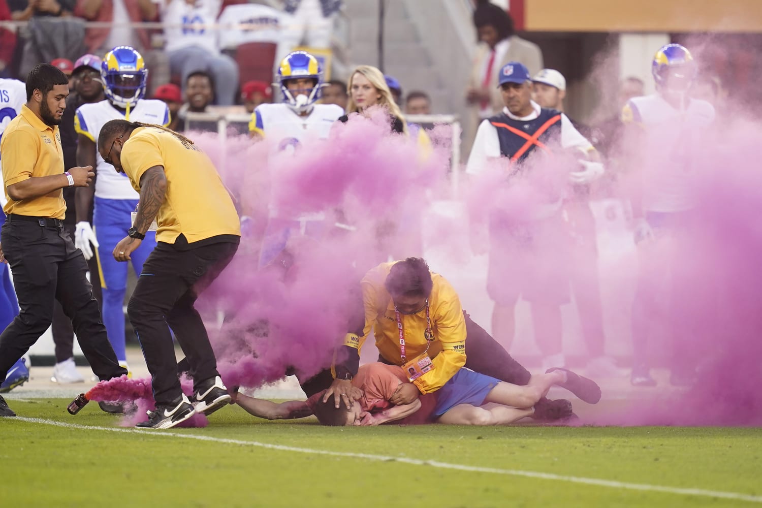 Manning brothers break down Los Angeles Rams linebacker Bobby Wagner taking  down fan running onto field on 'Monday Night Football' broadcast