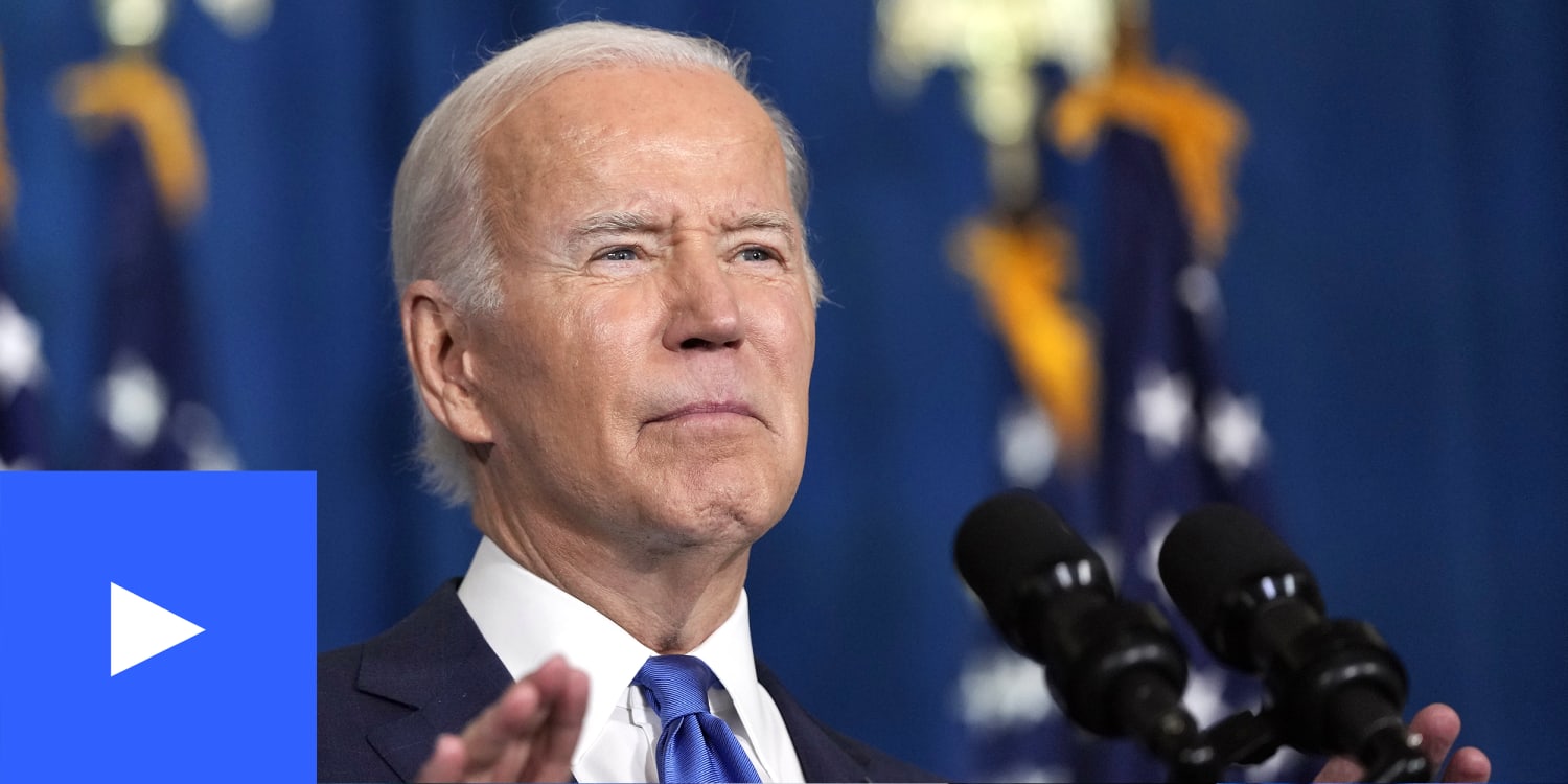 A photo of Joe Biden speaking at a podium