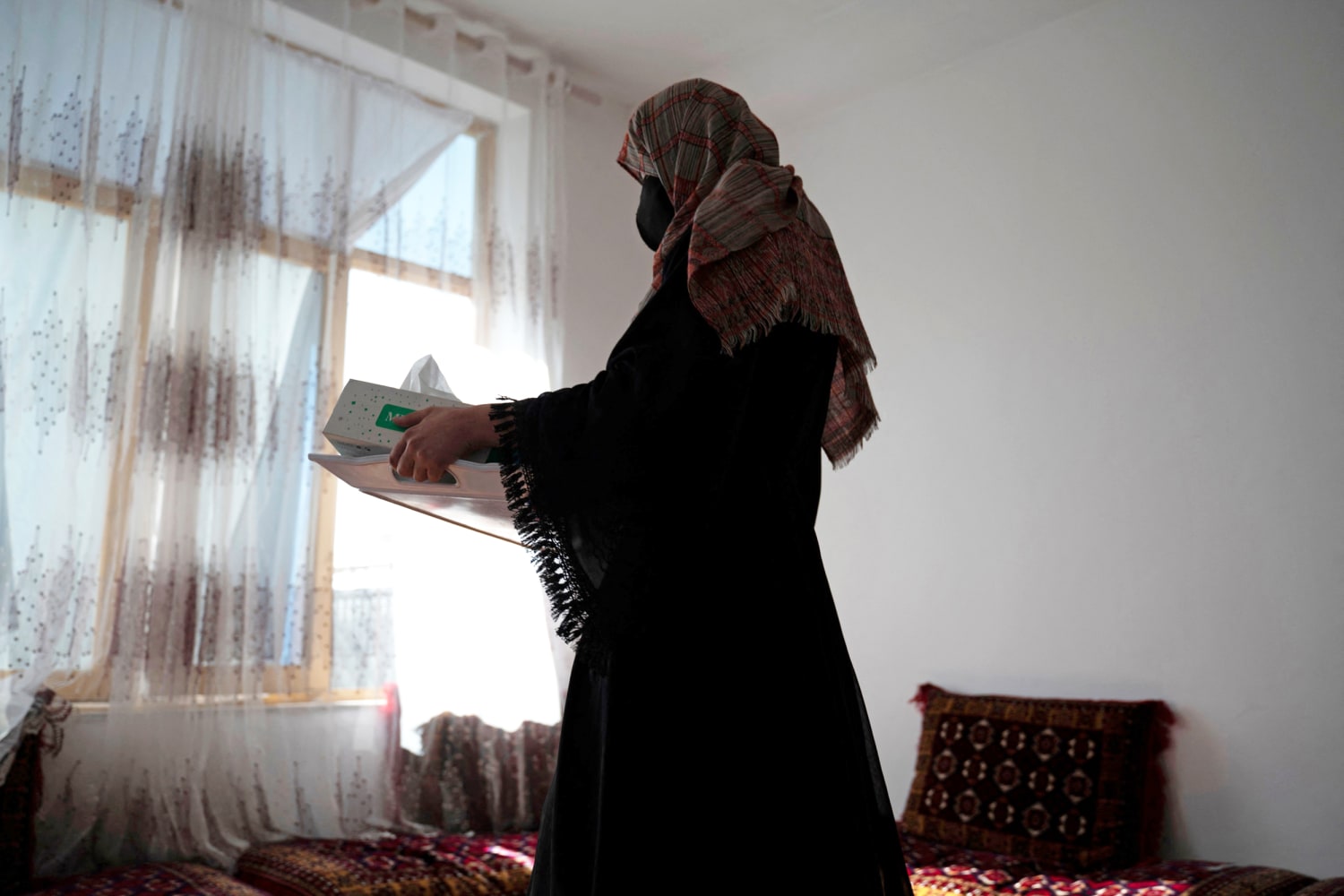 Taliban orders NGOs to stop women from coming to work