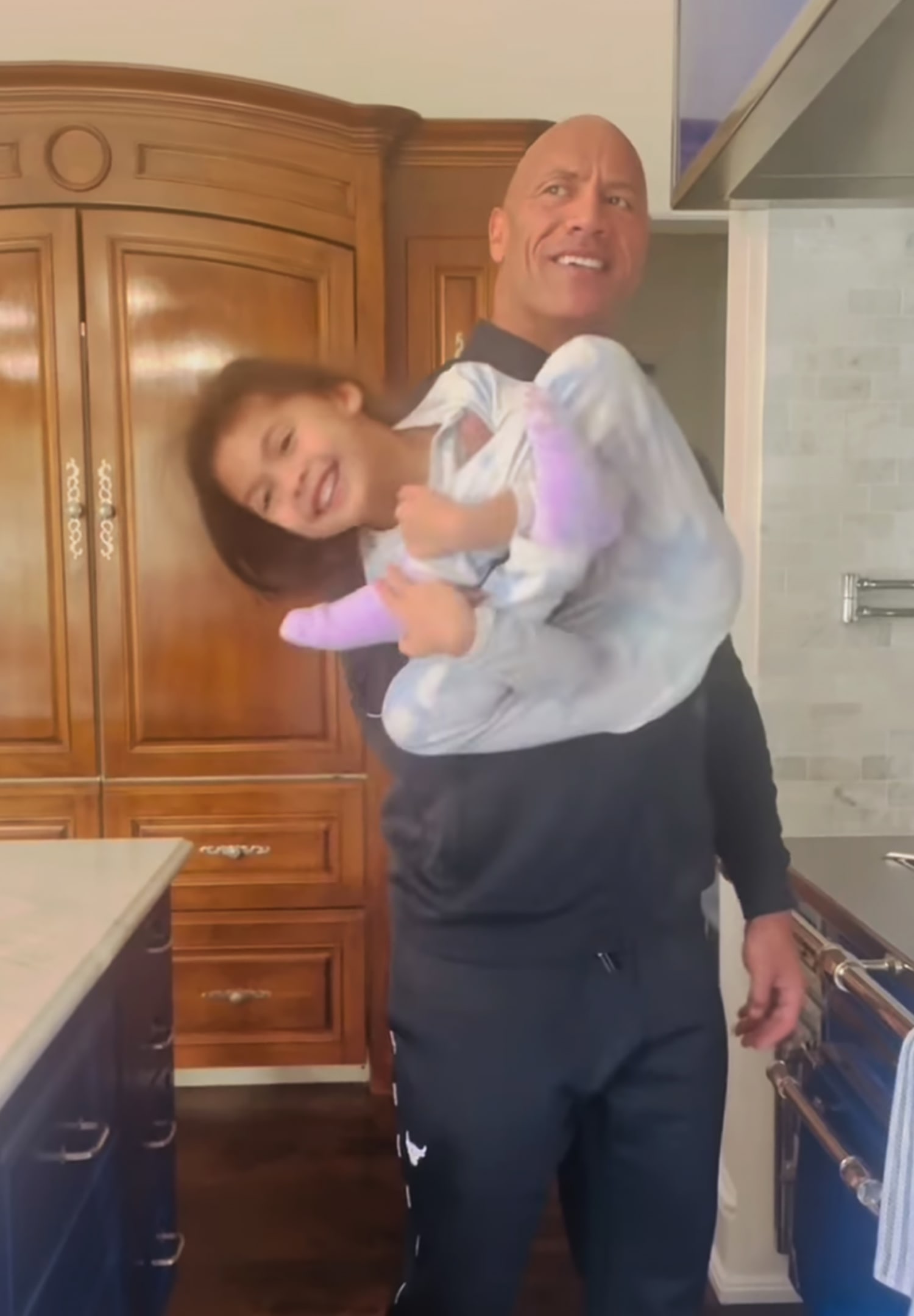 Rep Sleeping Daughter Videos - Dwayne Johnson's Workout Includes 'Daddy Curls' With His Daughter In New  Video