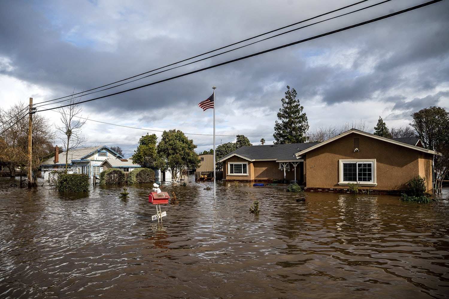 Roads turn to rivers as storms drench California, claiming lives and leaving many in the dark