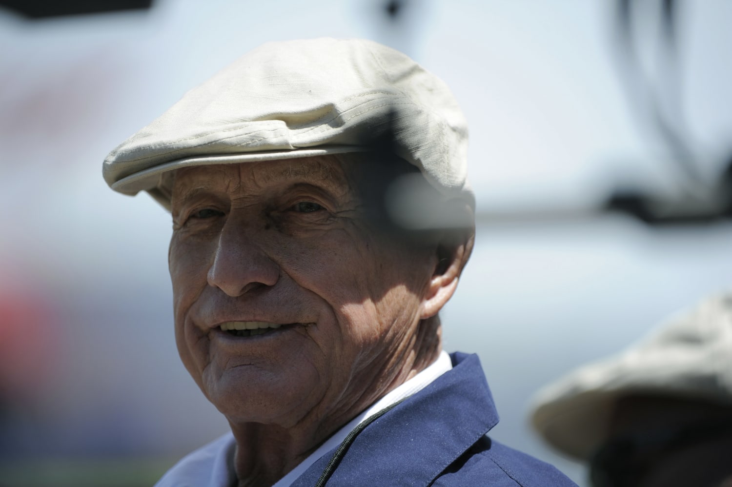 Longtime KC groundskeeper George Toma shows off his Super Bowl LIV