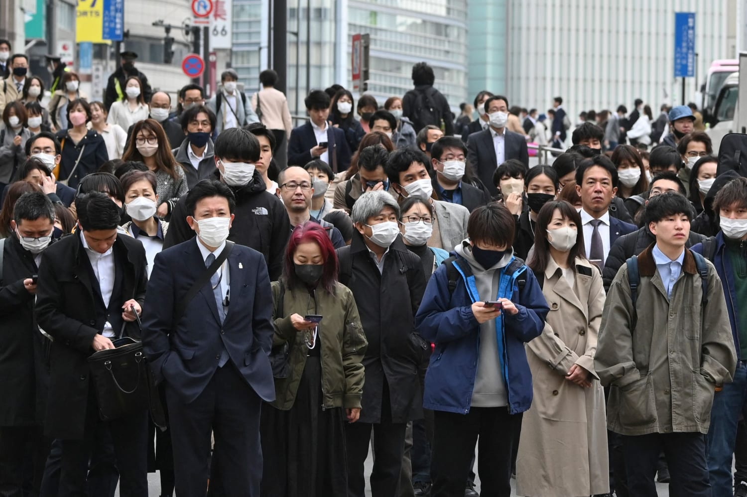 Masks in Japan even as 3-year request to wear them ends