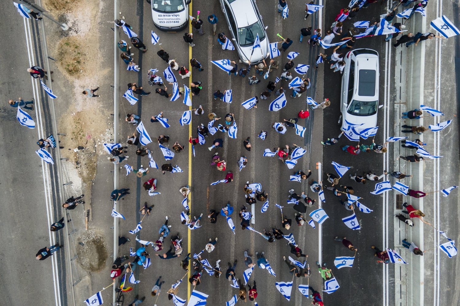 Israel passes law protecting Netanyahu as protests continue