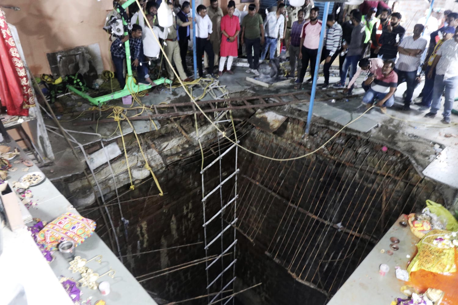 35 bodies found inside well after collapse at Indian temple