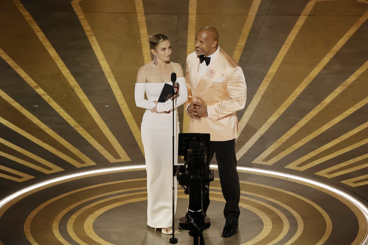 Emily Blunt Crashed The Rock's 2023 Oscars Red Carpet Interview After