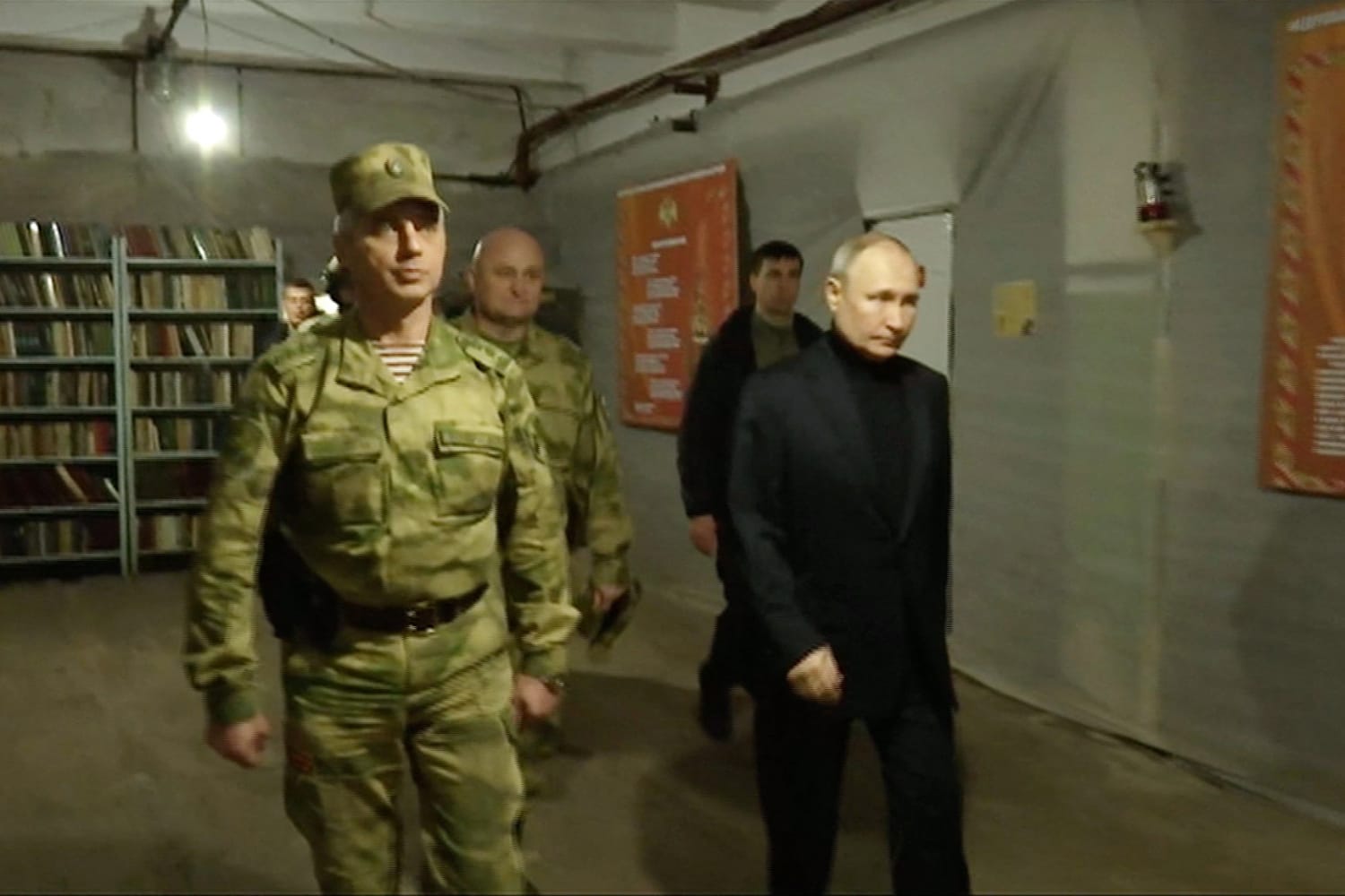 Putin appears at big rally as troops press attack in Ukraine