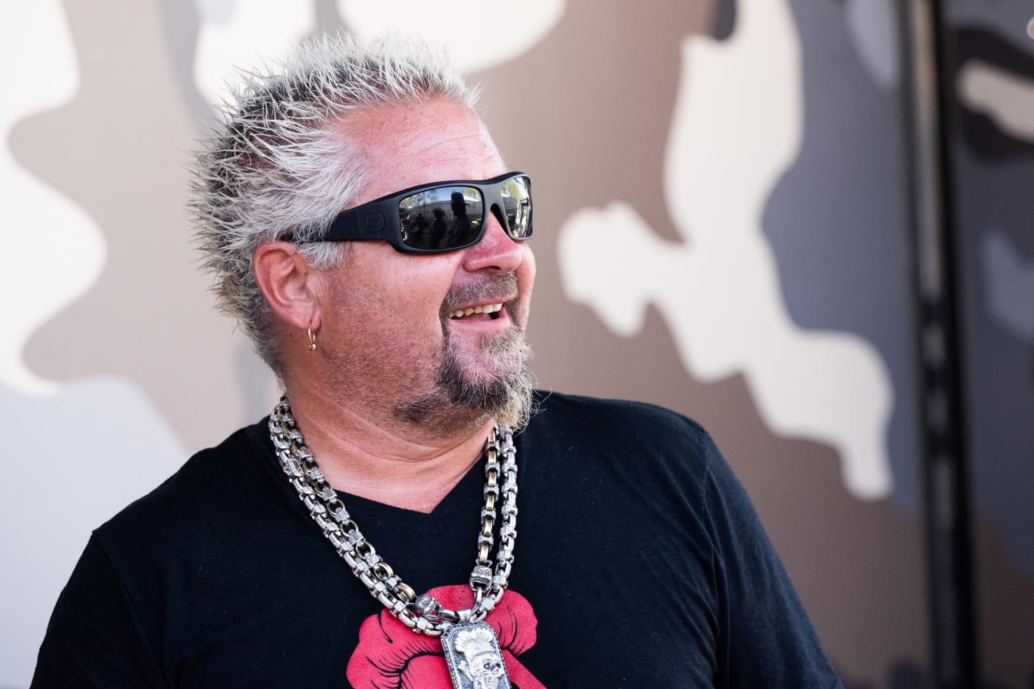 Guy Fieri told his kids he plans to 'die broke' unless they each earn 2 college degrees