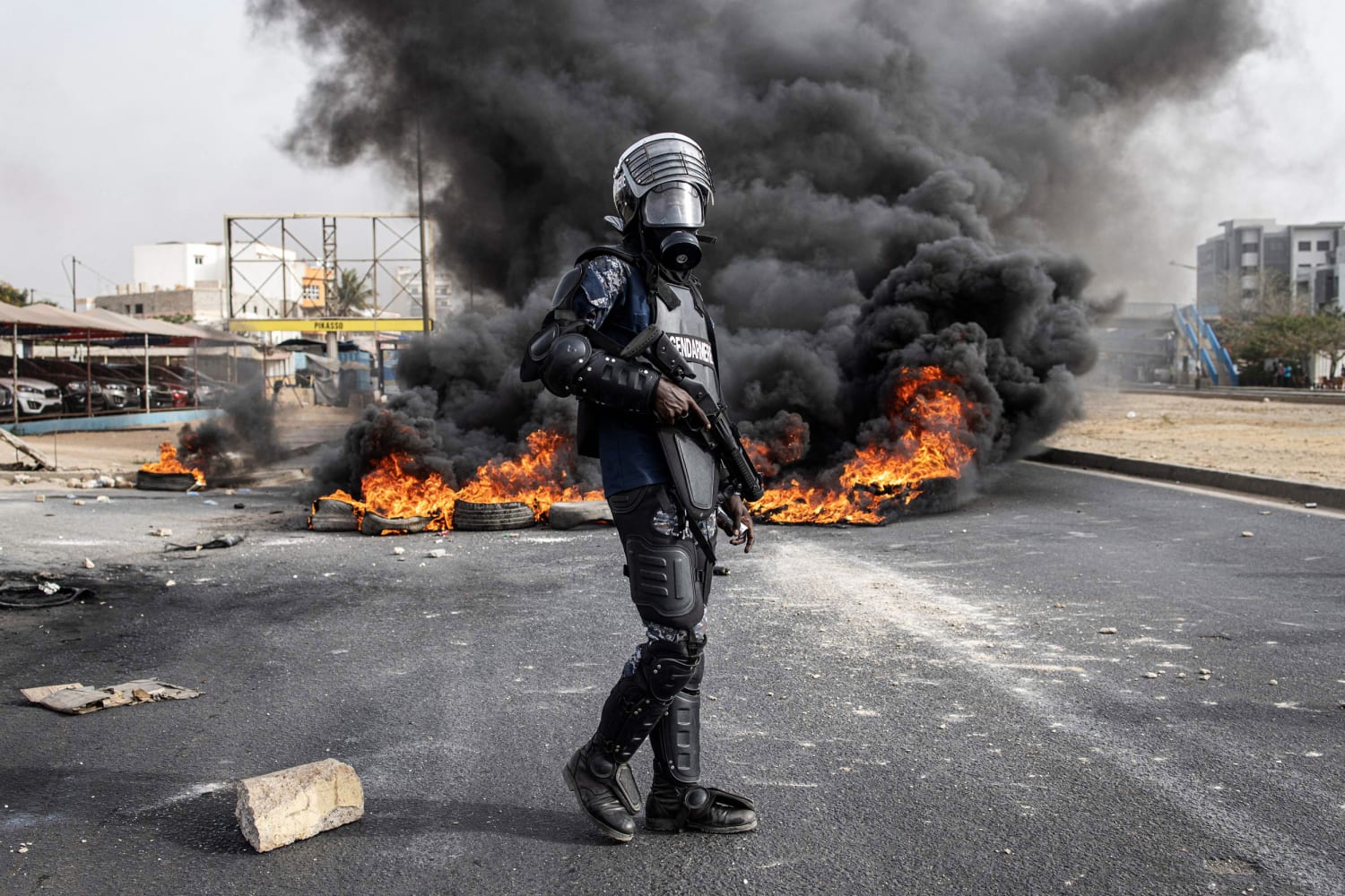 Clashes in Senegal leave at least 9 dead; government bans use of social media platforms