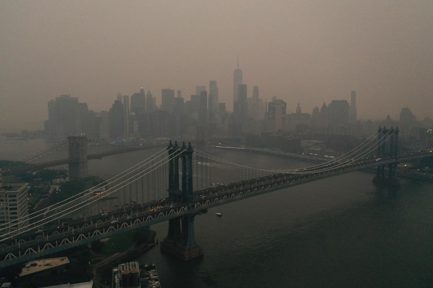 NYC landmarks are blanketed in smoke pouring across the Northeast from  Canadian wildfires