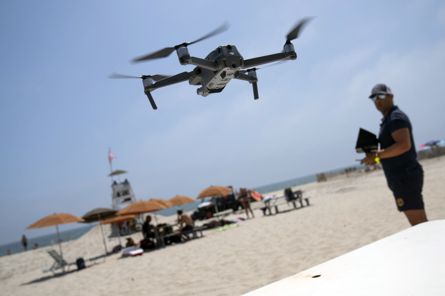 New York beach officials use drones to search for sharks amid a spate of attacks on swimmers
