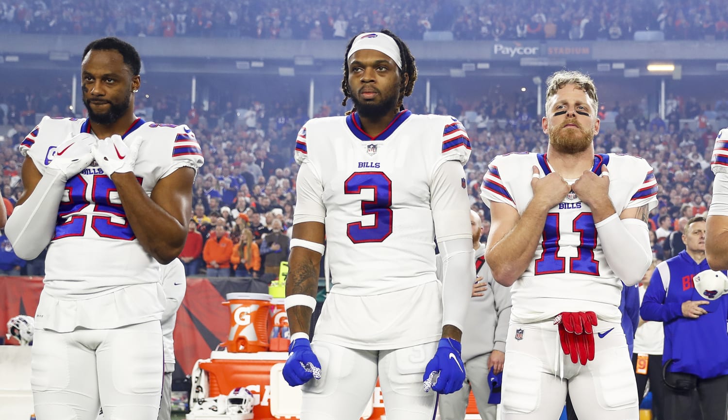 Cincinnati Bengals players kneel as Damar Hamlin is examined