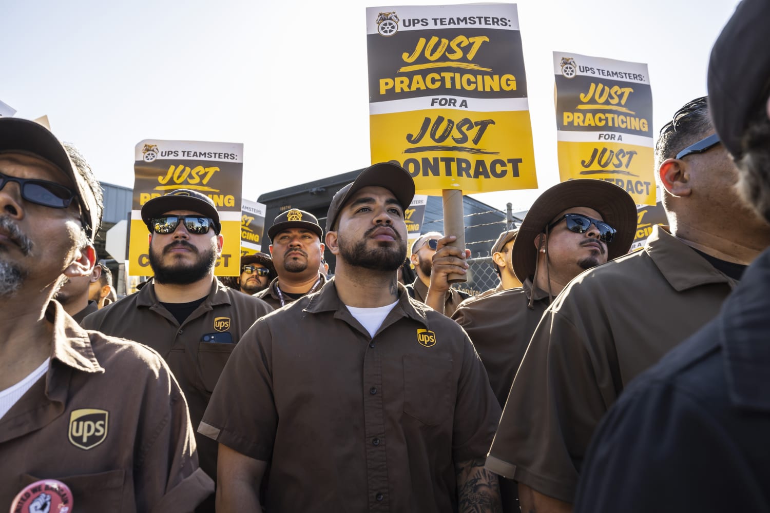 UPS workers overwhelmingly approve new contract, ending strike threat