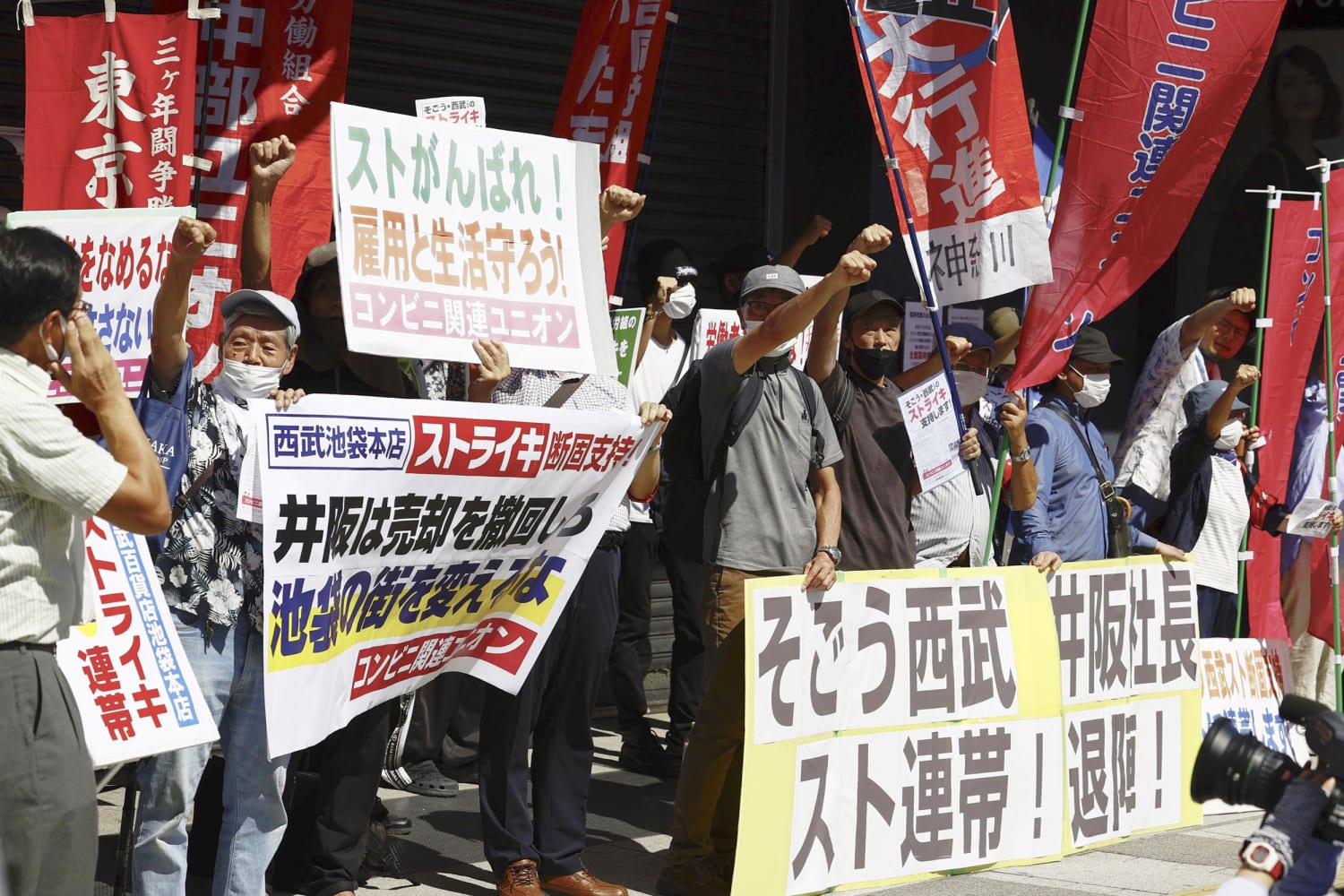 Workers stage Japan's first strike in decades over department