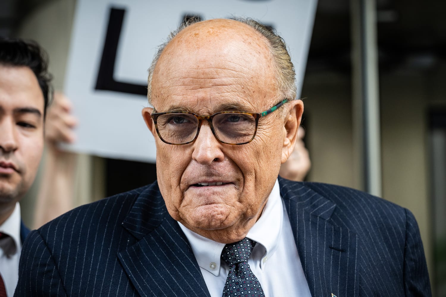 Trump is hosting a legal defense fundraiser for cash-strapped co-defendant Rudy Giuliani
