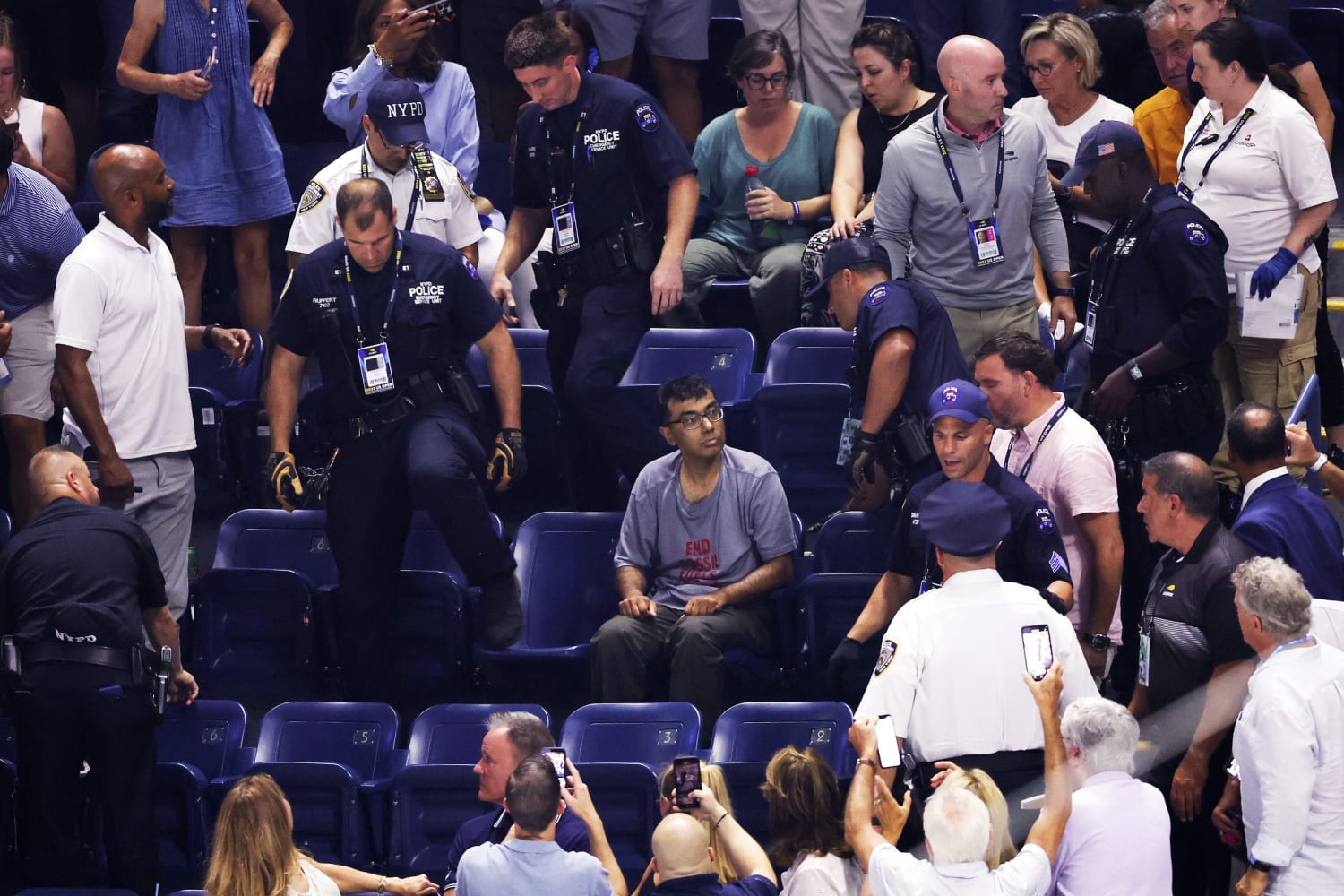 U.S. Open protesters charged with criminal trespass after disrupting match