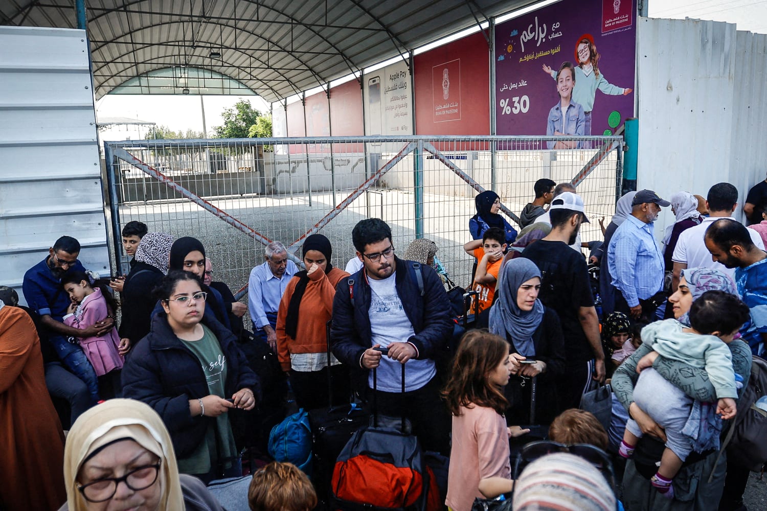 Palestinian American citizens hoping to escape Gaza eye the Rafah border crossing with Egypt