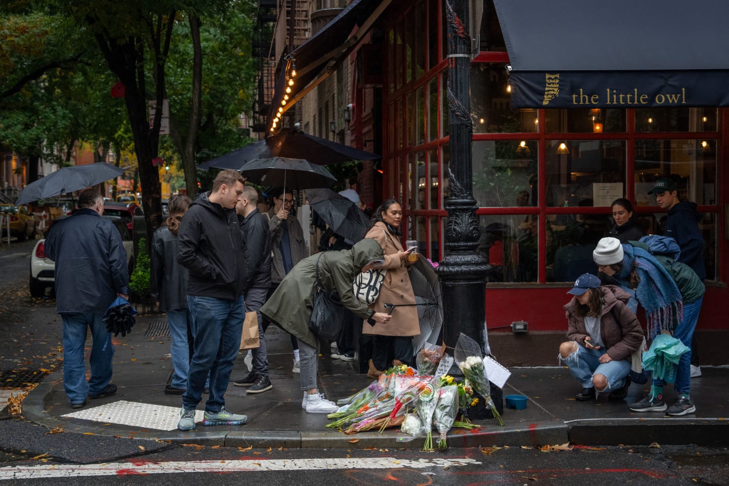 Fans Honor Matthew Perry with Tributes at Chandler Bing's N.Y.C. Apartment