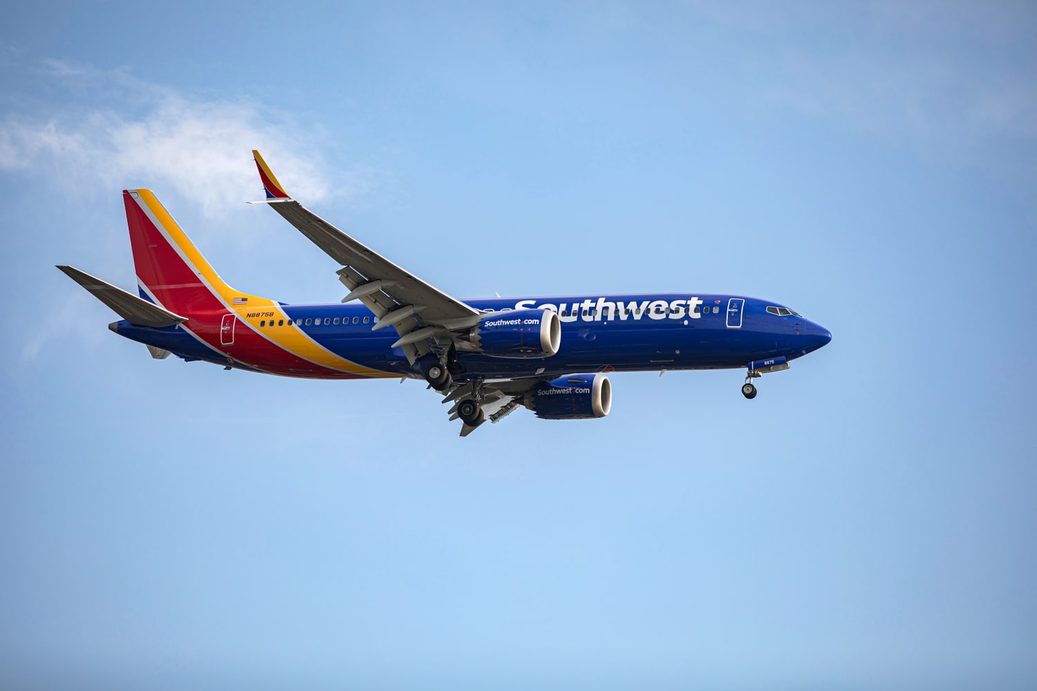 Officials say a Southwest Airlines passenger was hospitalized after opening an emergency exit and boarding the suite