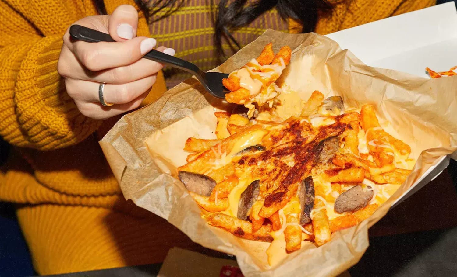 Taco Bell Debuts Grilled Cheese Nacho Fries And Nacho Fries Lover's Pass