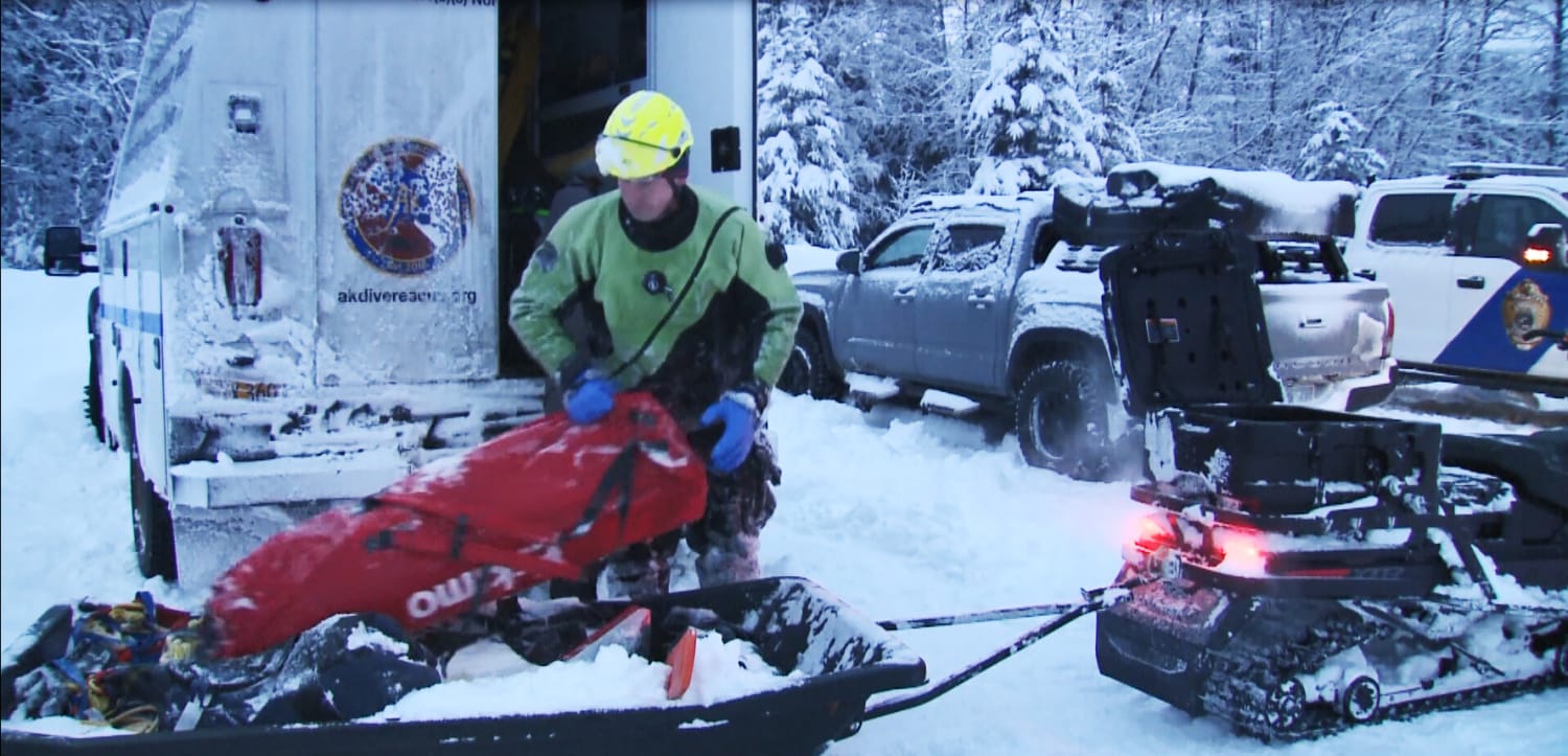Search resumes for woman who disappeared under frozen Alaska river while trying to rescue dog