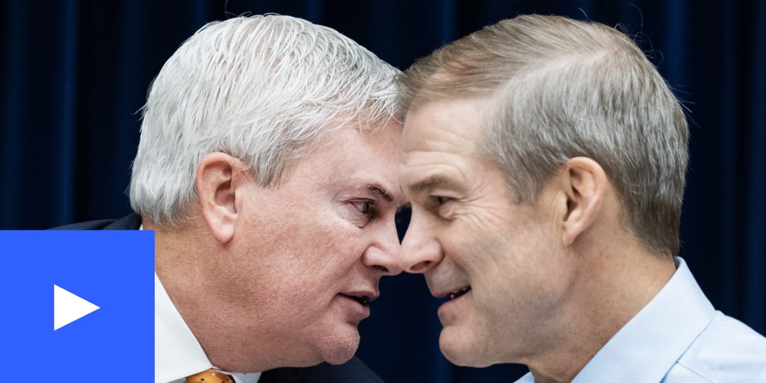 James Comer and Jim Jordan speaking closely