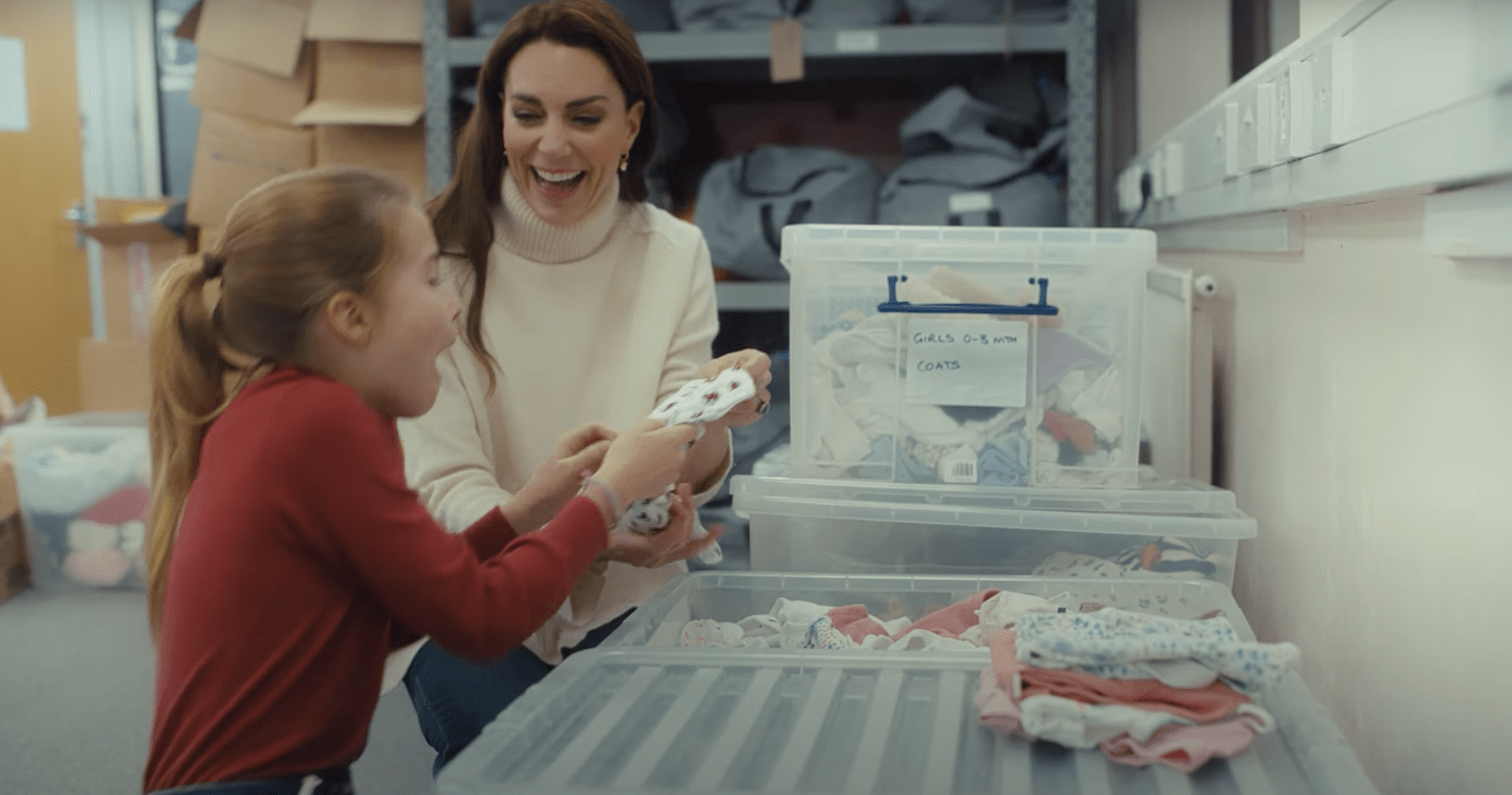 Princess Charlotte cracks up over a baby onesie in rare video of the royal kids volunteering