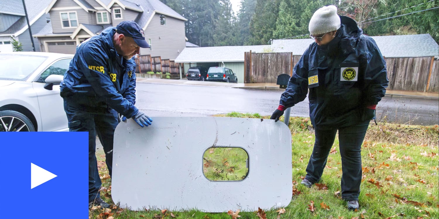 A photo of the Alaska Airlines door panel