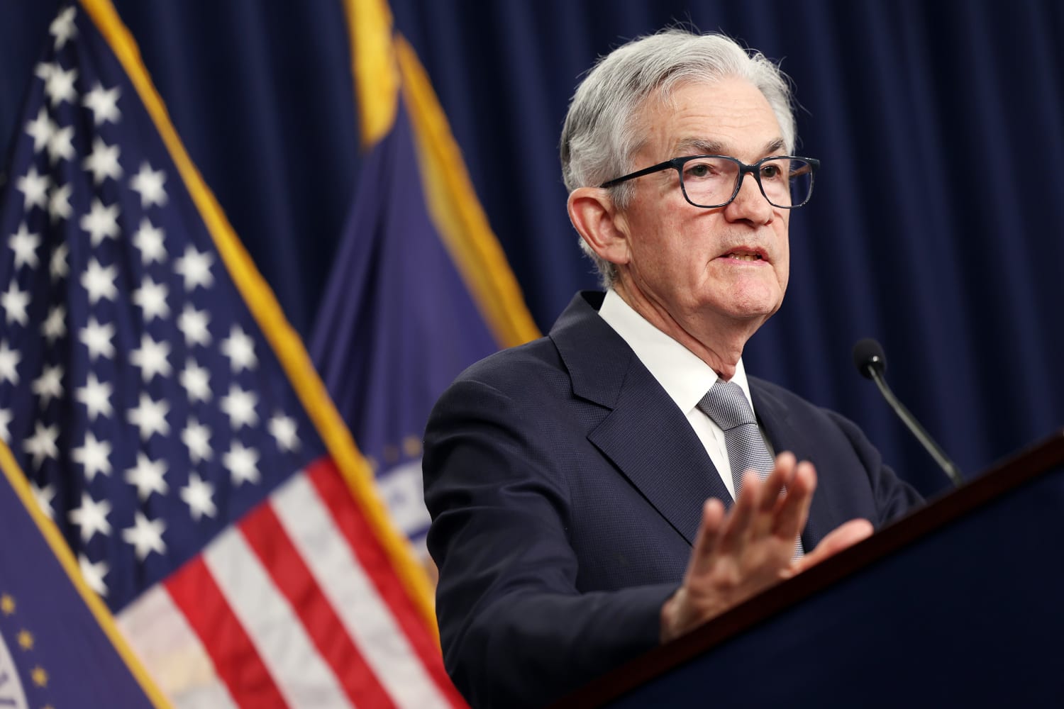 The Federal Reserve is keeping interest rates steady as consumer confidence improves and inflation slows