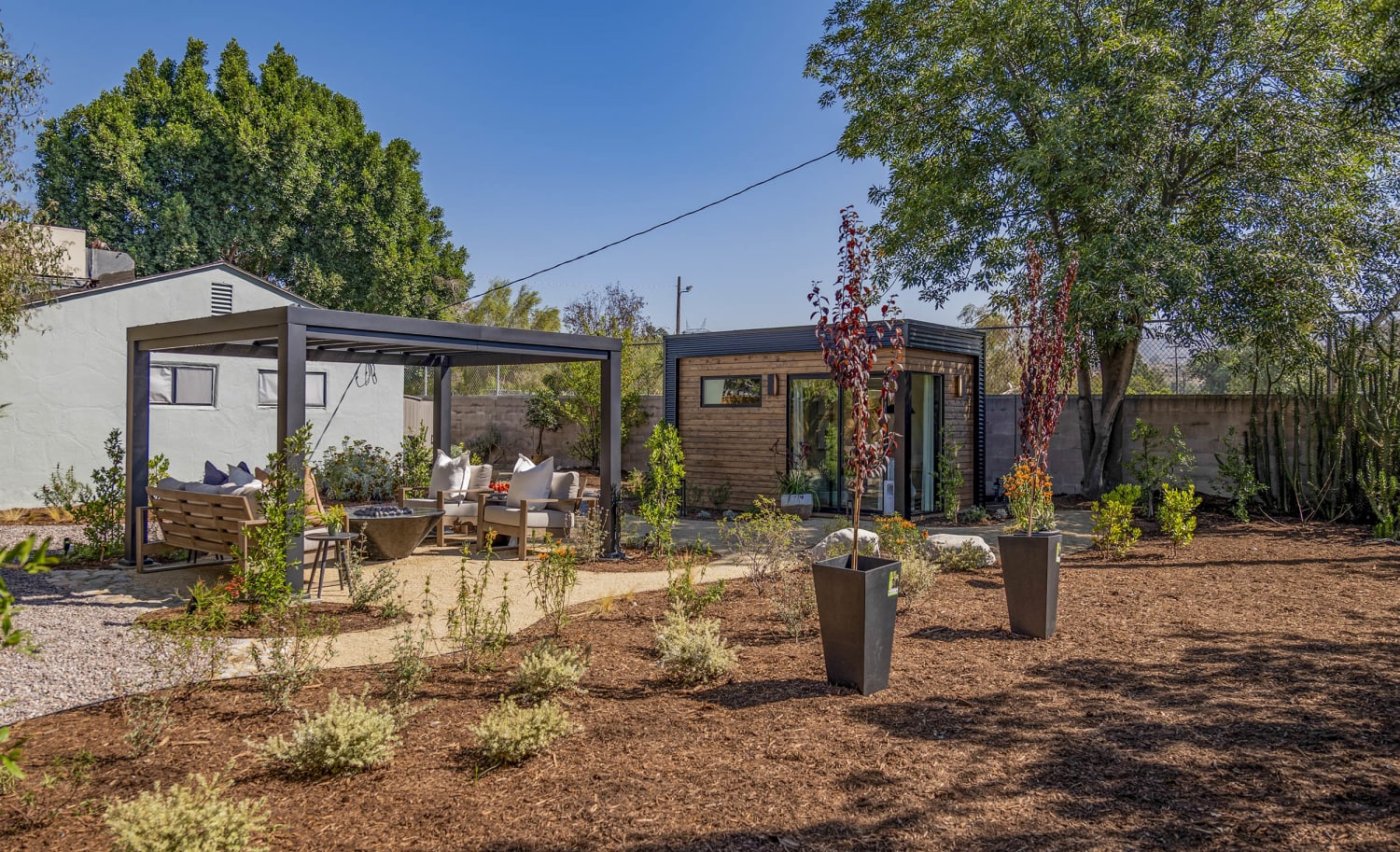 Mayim Bialik and the Property Brothers Complete a Backyard Makeover: Before  and After Pics